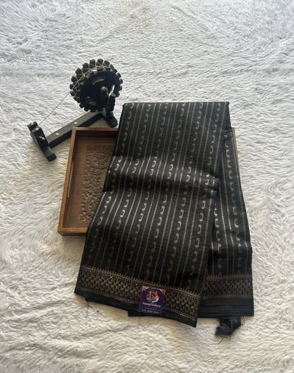 Semi Tussar Saree Colored Black Elegantly Paired with a Zari Border. - Sampradaya Designer Studio
