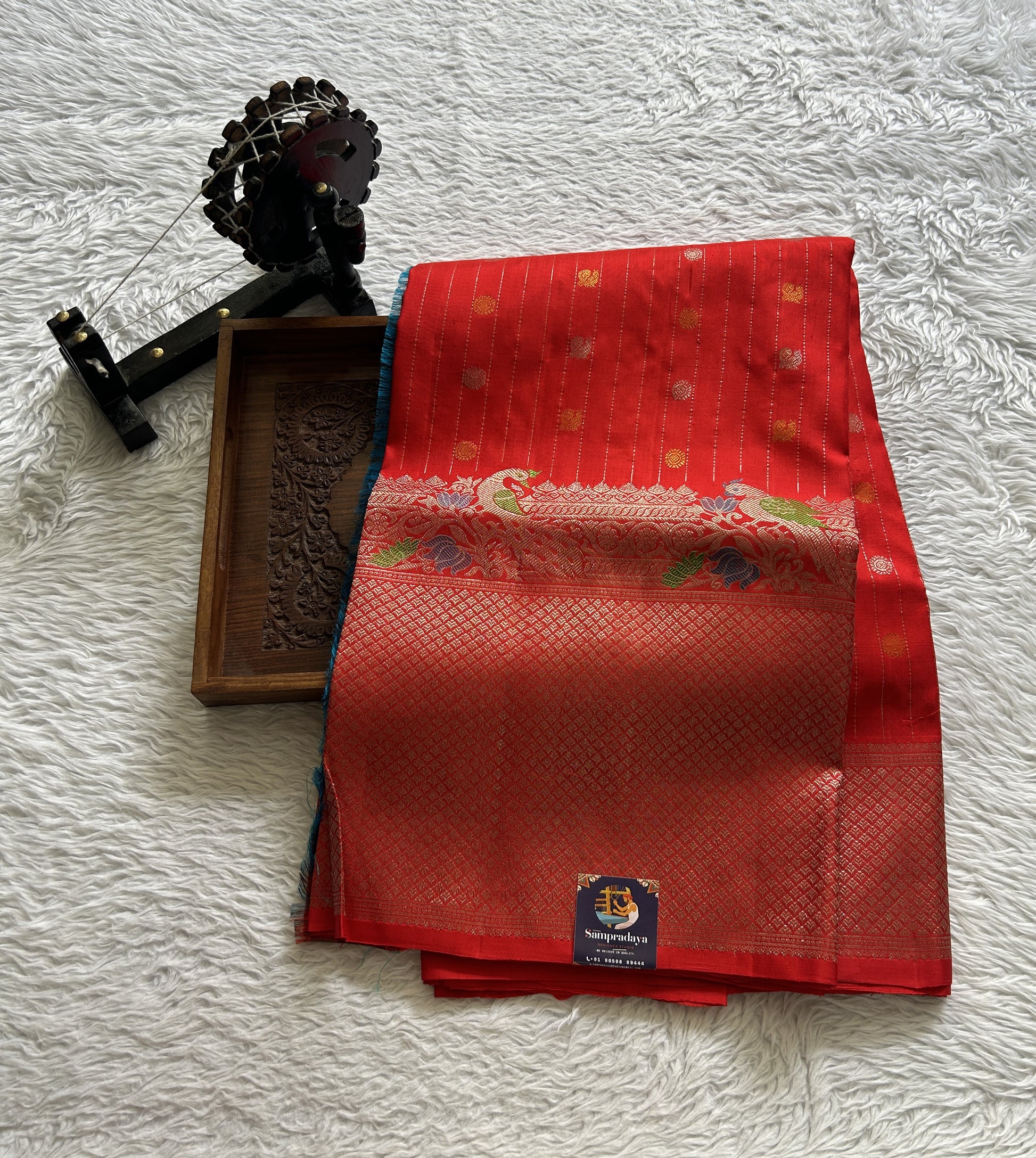 Gadwal Pattu Saree Red Colored Complemented With a Zari Border - Sampradaya Designer Studio