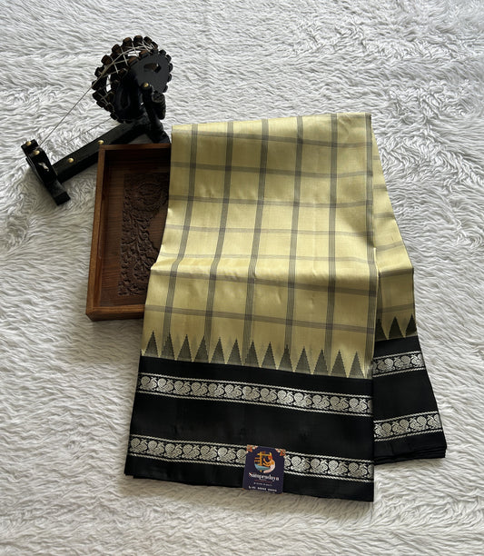 Gadwal Pattu Saree Cream Colored Complemented With a Black Color Zari Border - Sampradaya Designer Studio