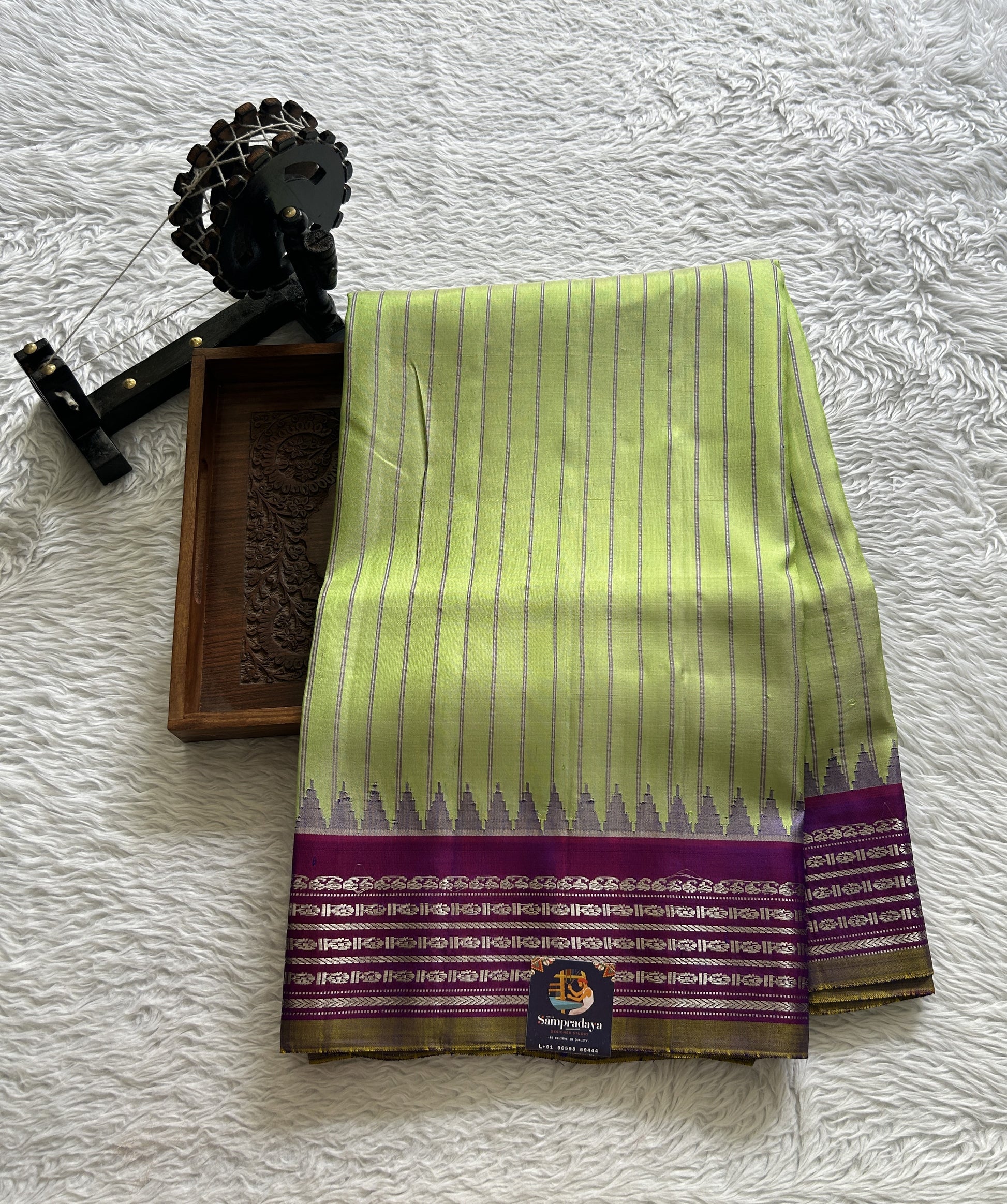 Gadwal Pattu Saree Light Green Colored Complemented With a Purple Color Zari Border - Sampradaya Designer Studio
