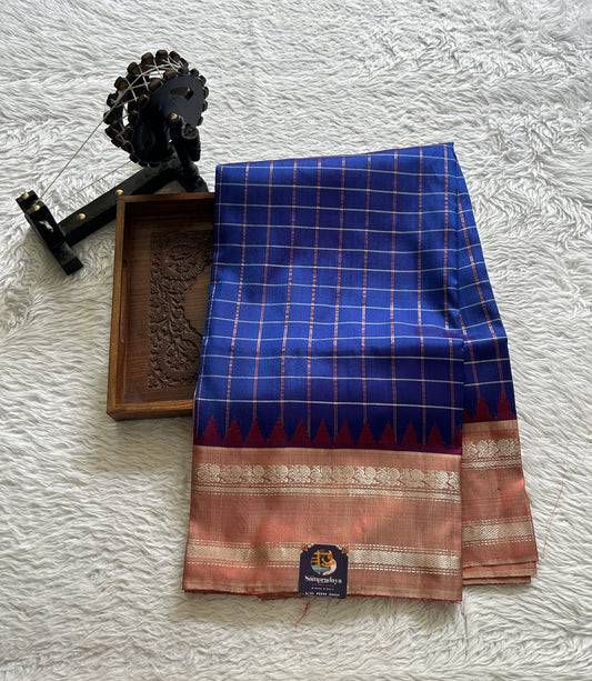 Gadwal Pattu Saree Blue Colored Complemented With a Orange Color Zari Border - Sampradaya Designer Studio