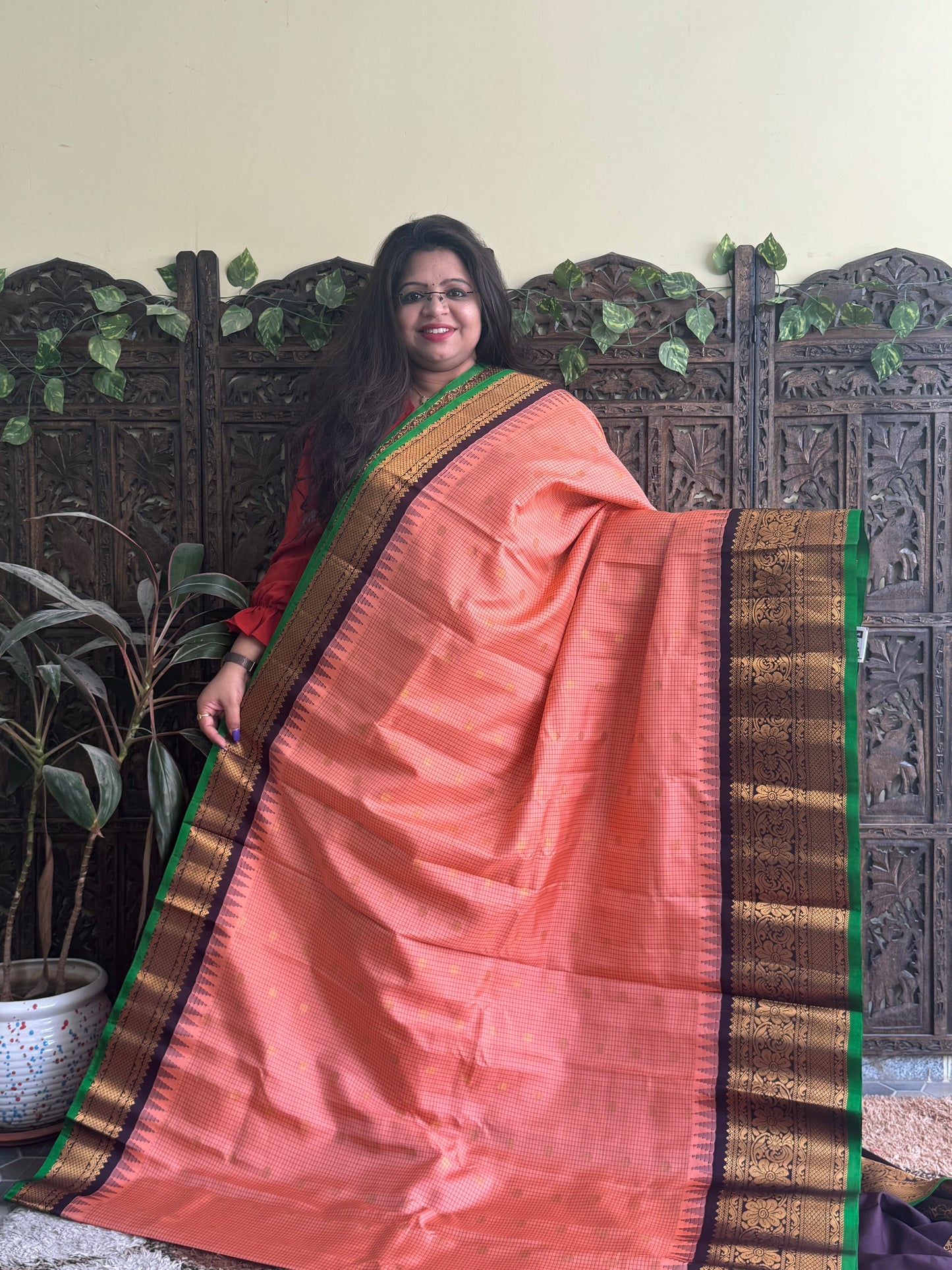 Gadwal Pattu Saree Peach colored saree complemented with a Brown Zari border - Sampradaya Designer Studio