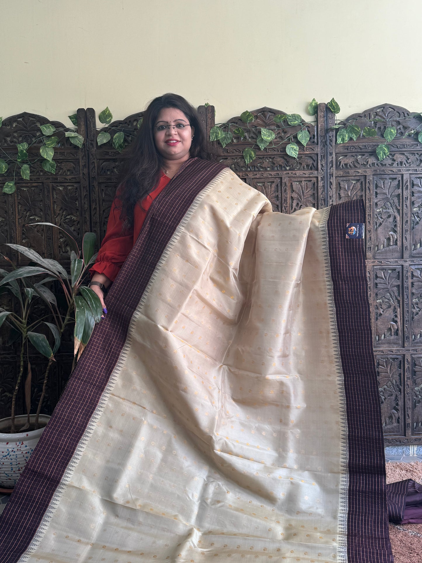 Gadwal Pattu Saree Cream colored saree complemented with a Brown Checks border - Sampradaya Designer Studio