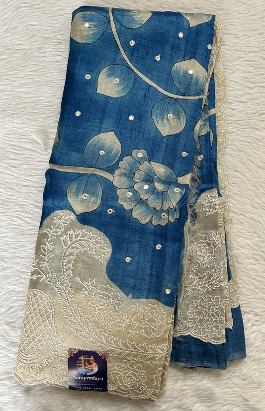 Tussar Silk Saree Blue colored Saree complemented with a Cream Colored Chikankari border. - Sampradaya Designer Studio