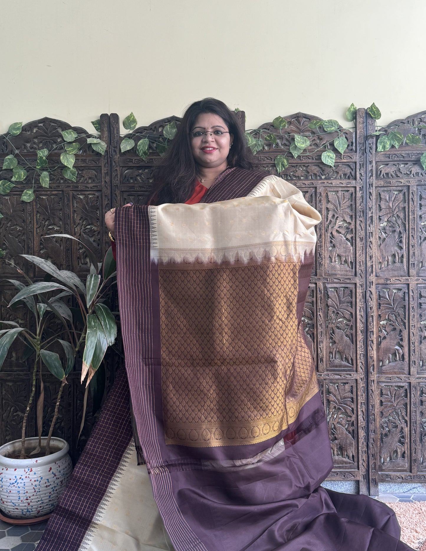 Gadwal Pattu Saree Cream colored saree complemented with a Brown Checks border - Sampradaya Designer Studio