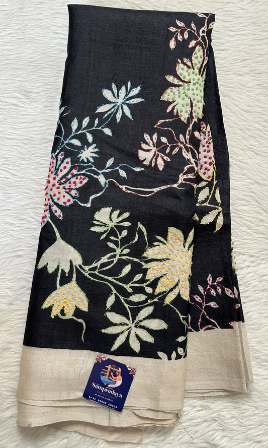 Tussar Silk Saree Black colored Saree complemented with a Cream Colored Plain border. - Sampradaya Designer Studio