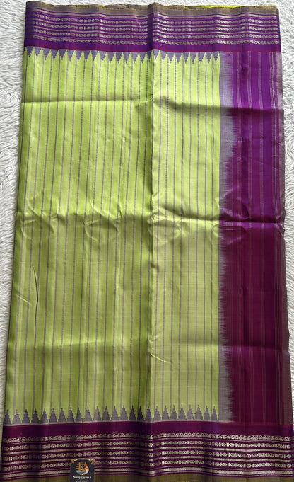Gadwal Pattu Saree Light Green Colored Complemented With a Purple Color Zari Border - Sampradaya Designer Studio