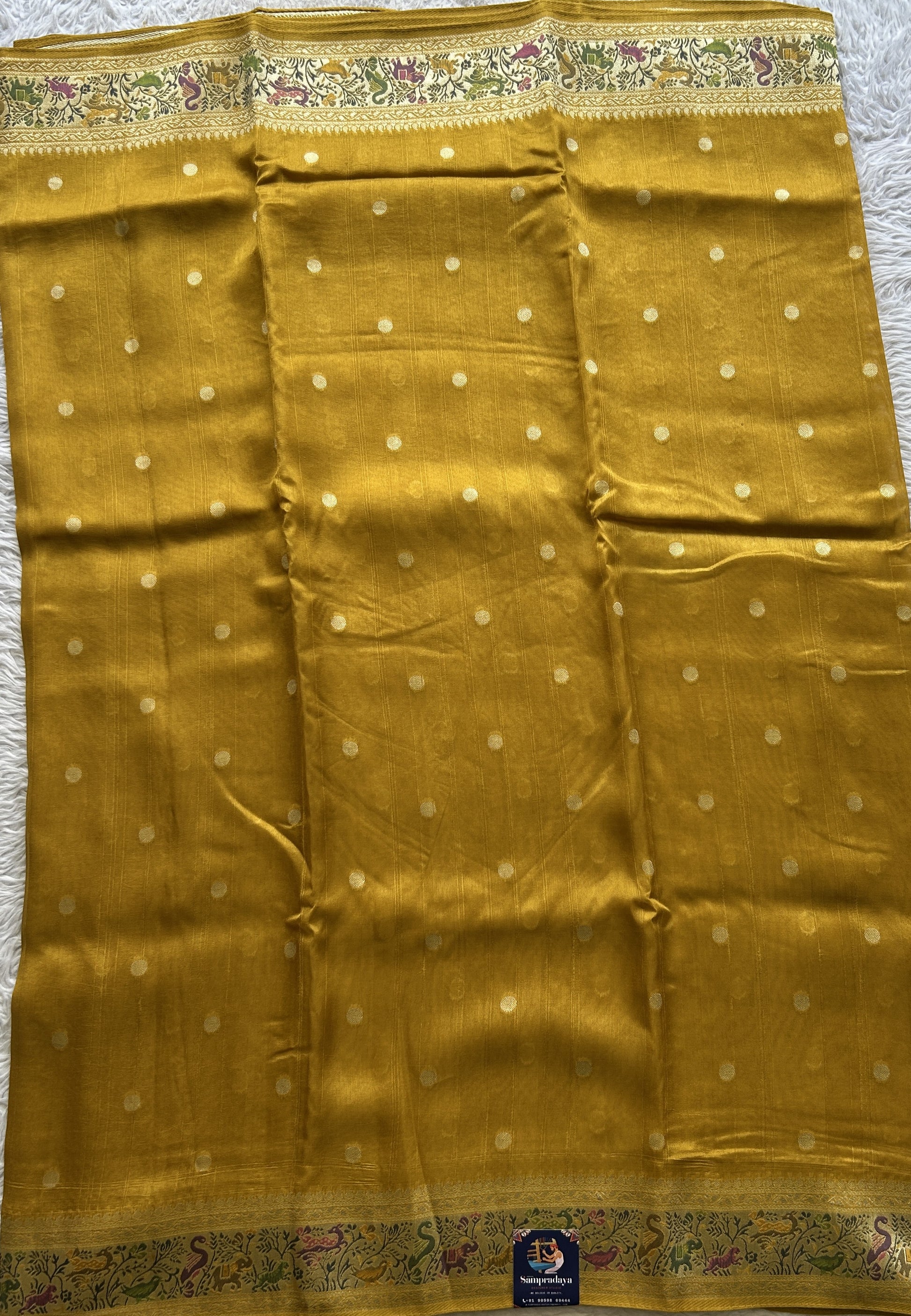 Banarasi Tussar Georgette Saree Yellow Colored Exquisite Minakari Border. - Sampradaya Designer Studio