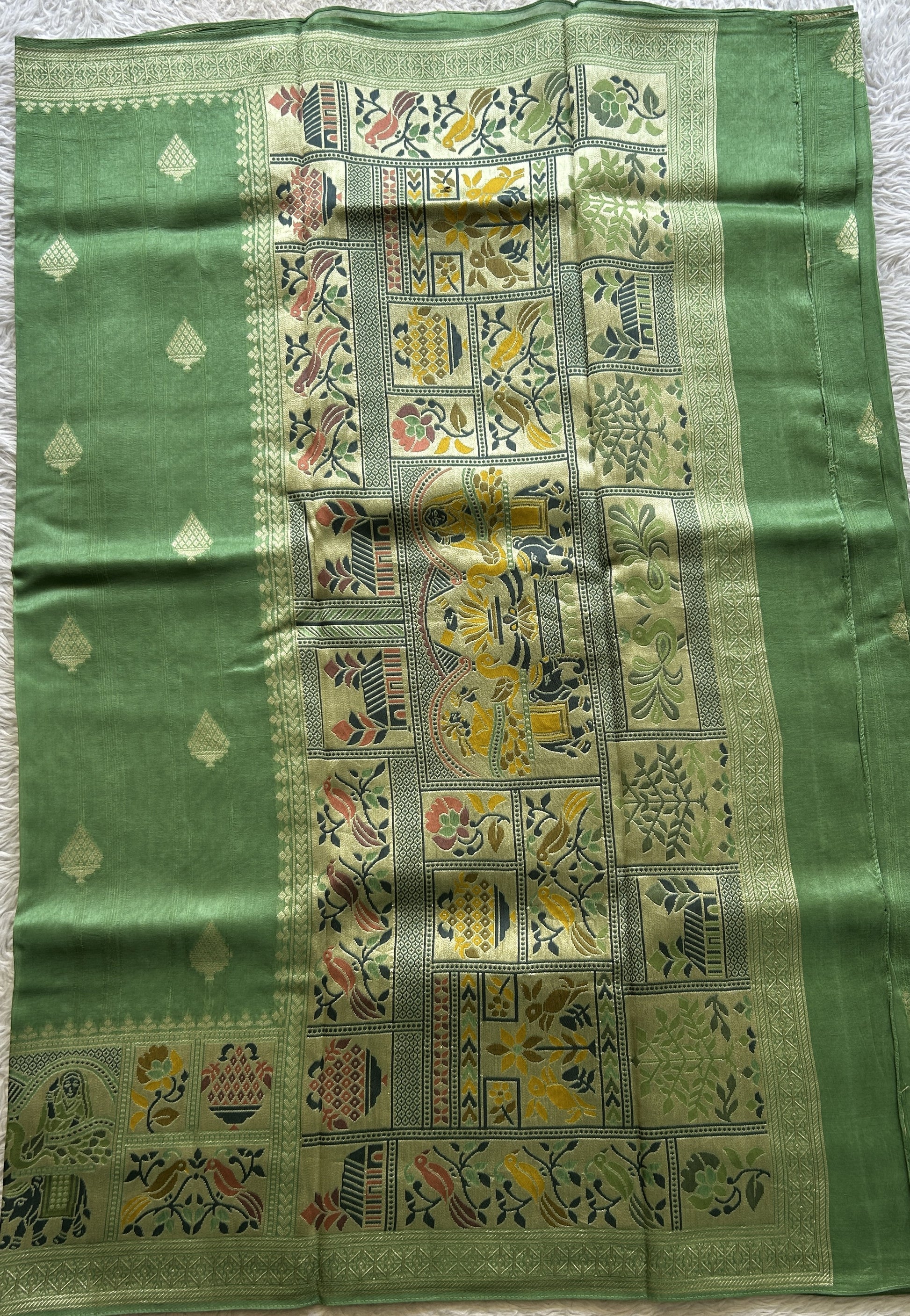 Banarasi Tussar Georgette Saree Light Green Colored Exquisite Minakari Border. - Sampradaya Designer Studio