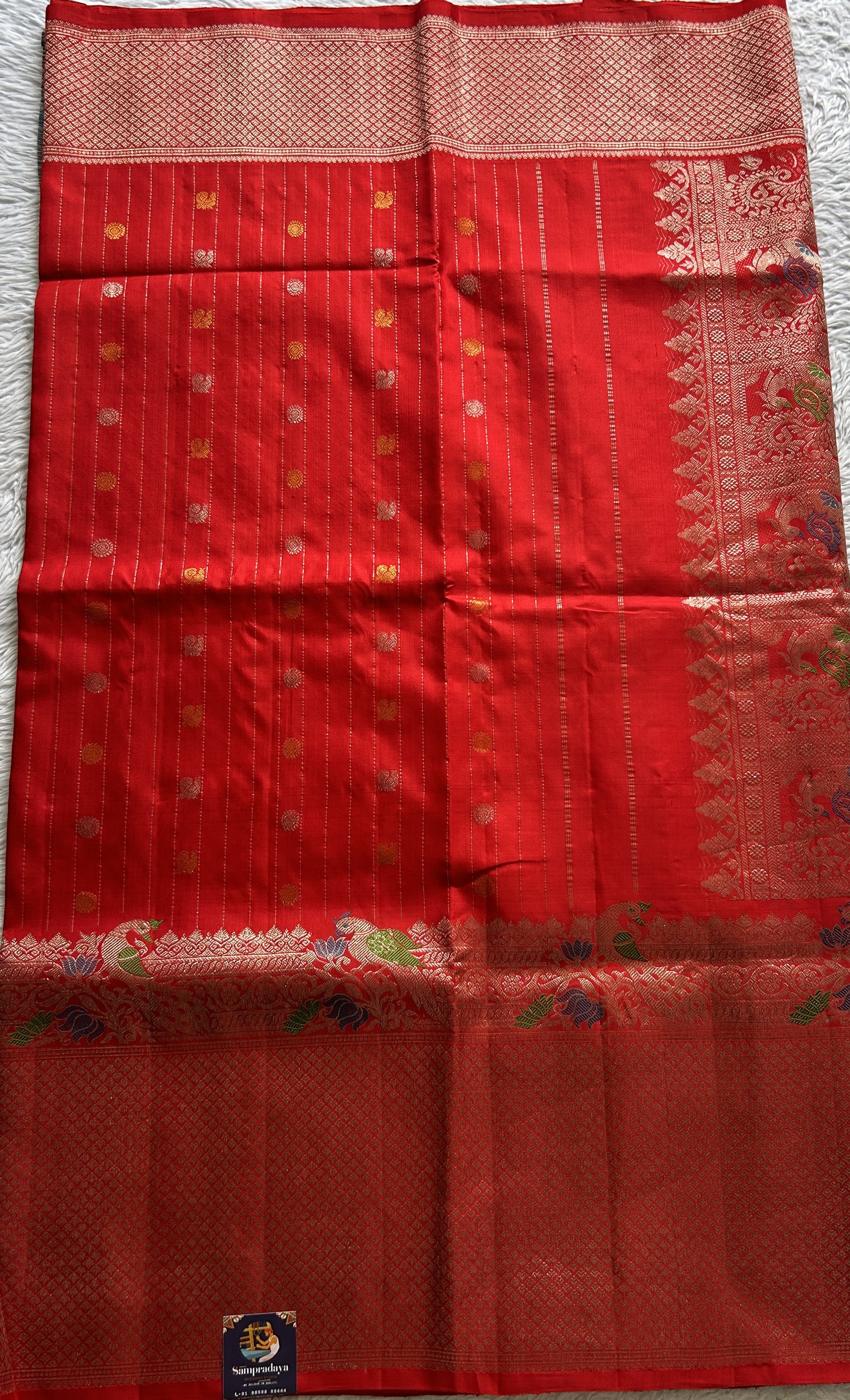 Gadwal Pattu Saree Red Colored Complemented With a Zari Border - Sampradaya Designer Studio