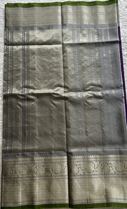 Gadwal Pattu Saree Purple Colored Complemented With a Gray Color Zari Border - Sampradaya Designer Studio
