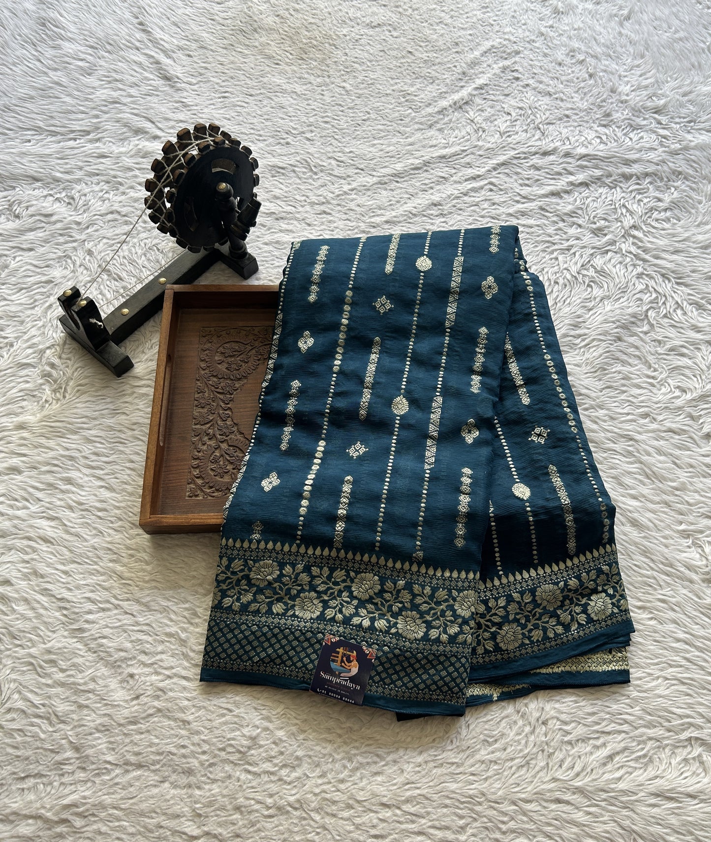 Semi Georgette Saree Peacock Blue Colored Paired with a Zari Border. - Sampradaya Designer Studio