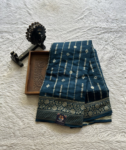 Semi Georgette Saree Peacock Blue Colored Paired with a Zari Border. - Sampradaya Designer Studio