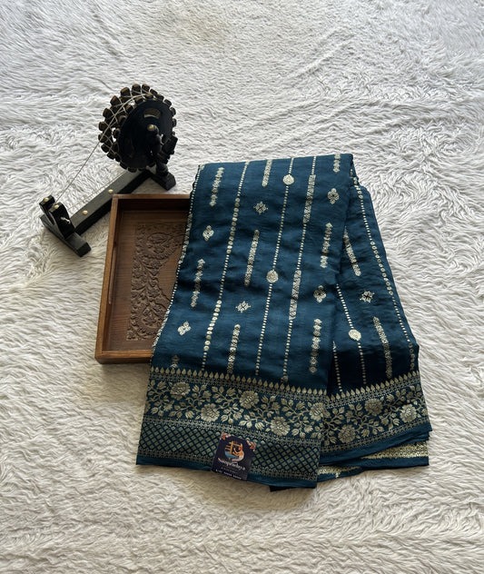 Semi Georgette Saree Peacock Blue Colored Paired with a Zari Border. - Sampradaya Designer Studio