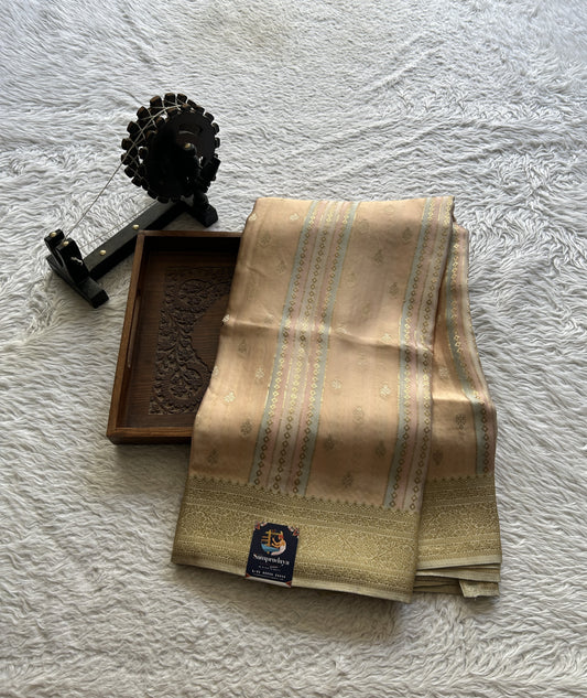 Pure Banarasi Crepe Silk Saree Light Peach Colored Complemented with a Zari border. - Sampradaya Designer Studio