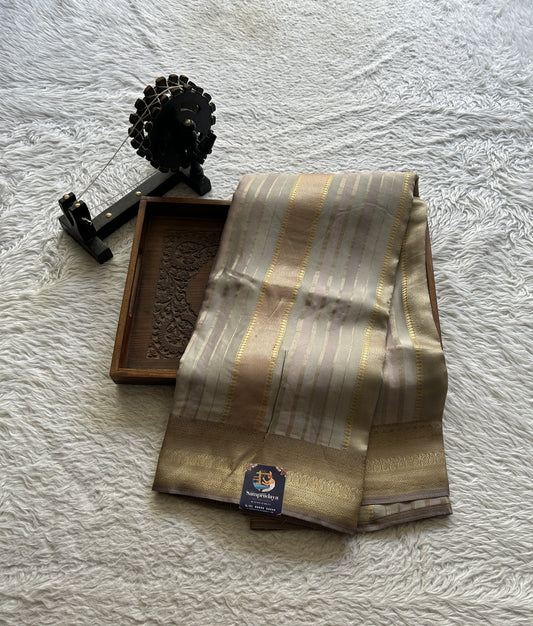 Pure Banarasi Crepe Silk Saree Light Gray Colored Complemented with a Zari border. - Sampradaya Designer Studio