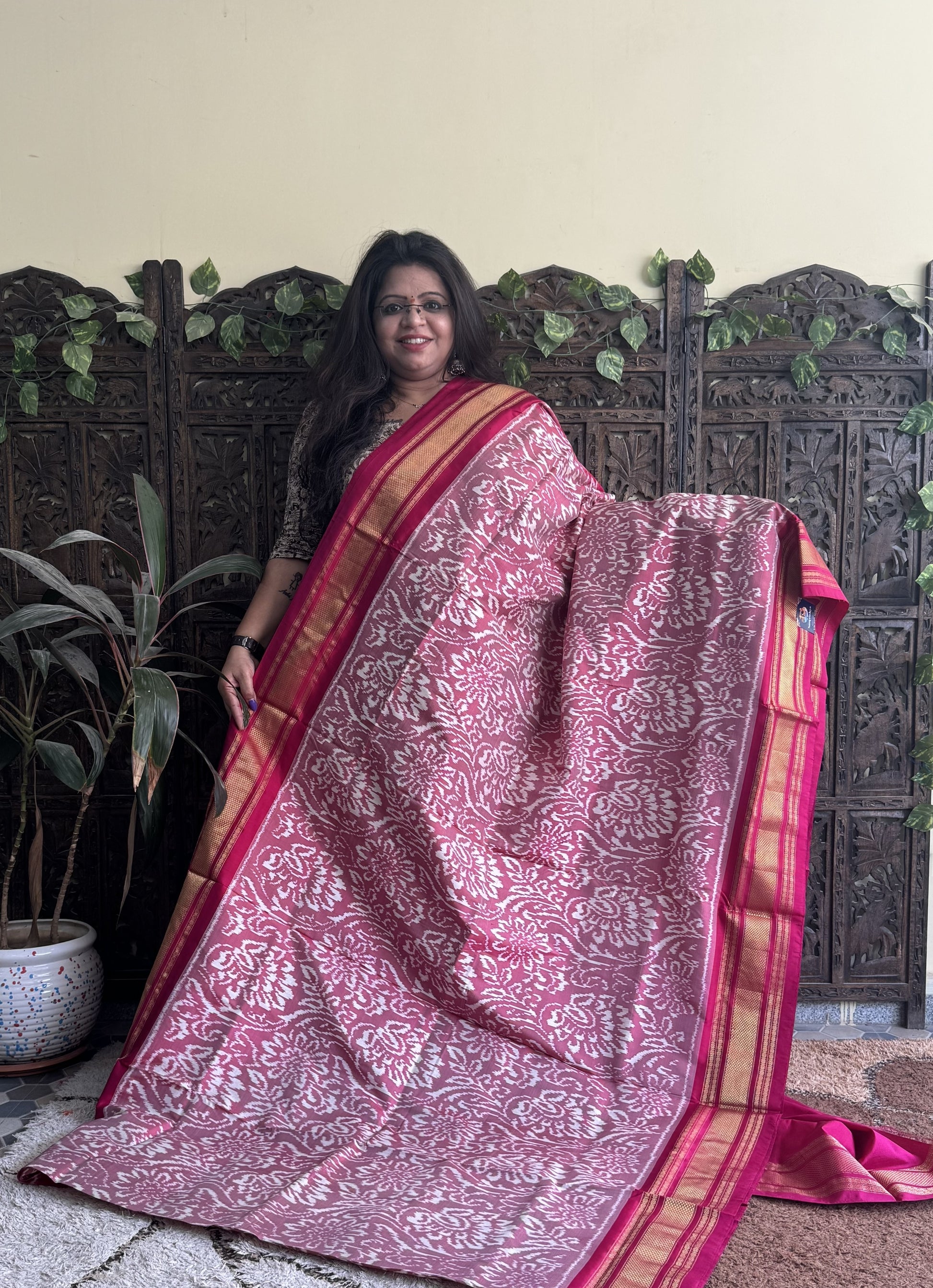 Ikkat Pattu Saree Onion Pink colored complemented with a Kanchi border. - Sampradaya Designer Studio