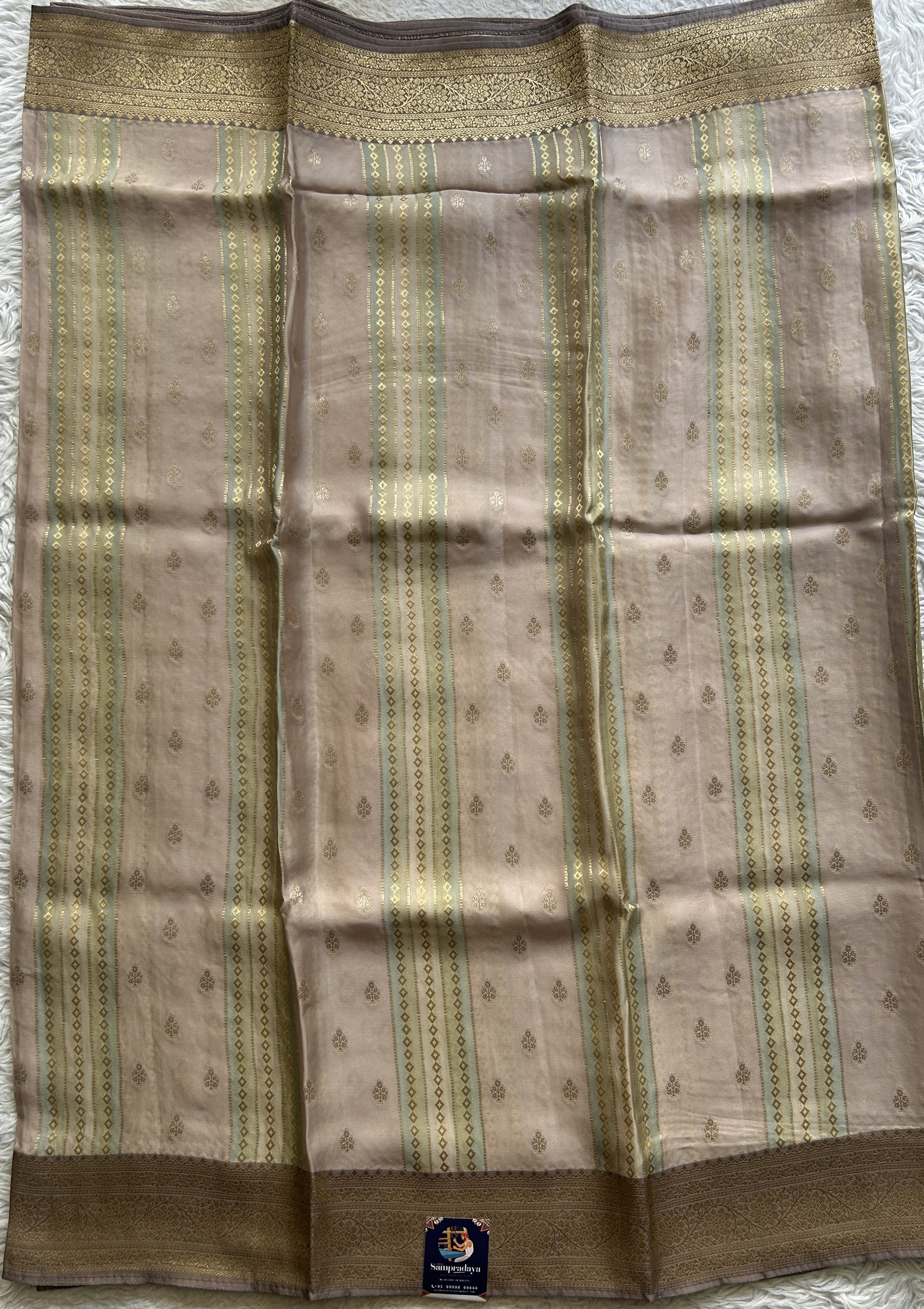 Pure Banarasi Crepe Silk Saree Very Light Pink Colored Complemented with a Zari border. - Sampradaya Designer Studio
