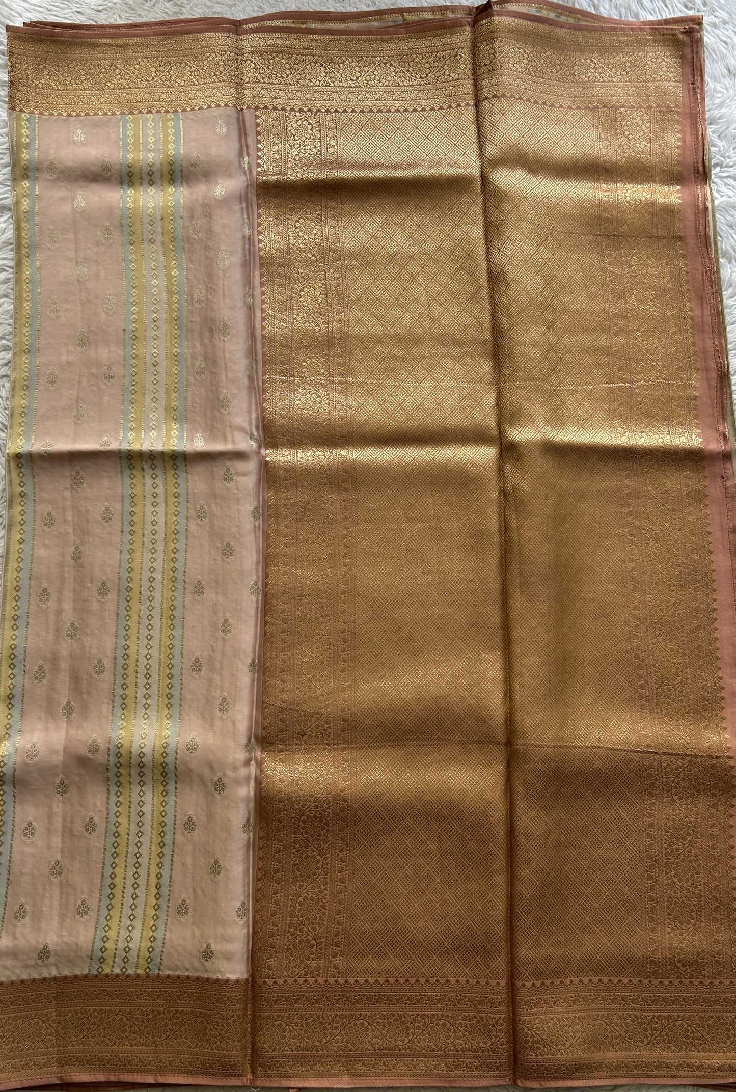 Pure Banarasi Crepe Silk Saree Melon Colored Complemented with a Zari border. - Sampradaya Designer Studio