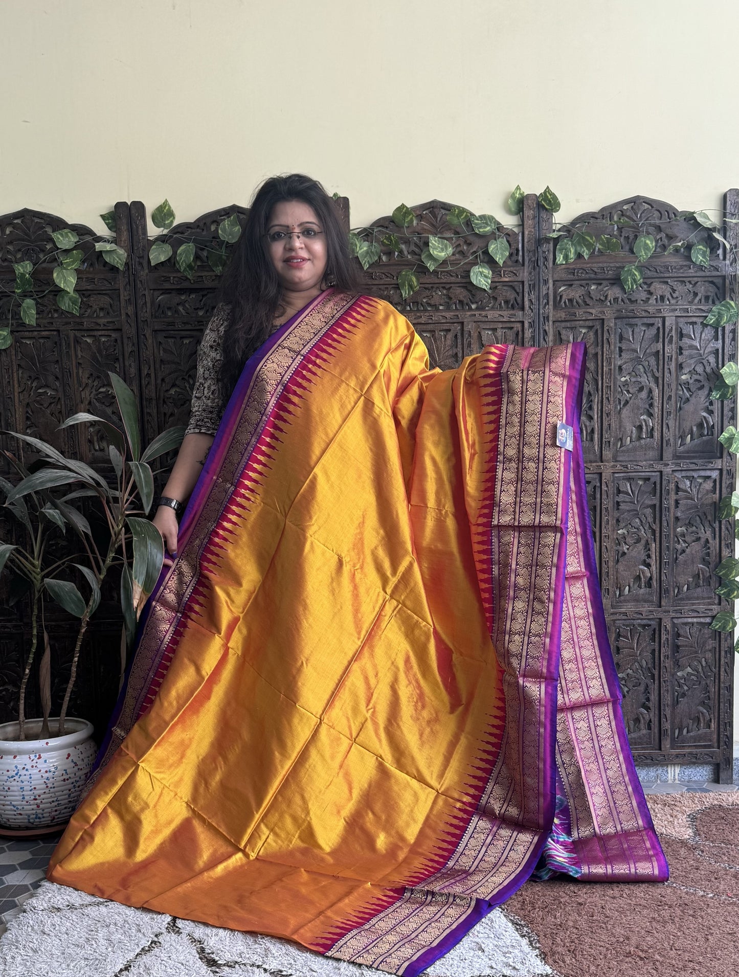 Ikkat Pattu Saree Mustard Yellow colored complemented with a Kanchi border. - Sampradaya Designer Studio