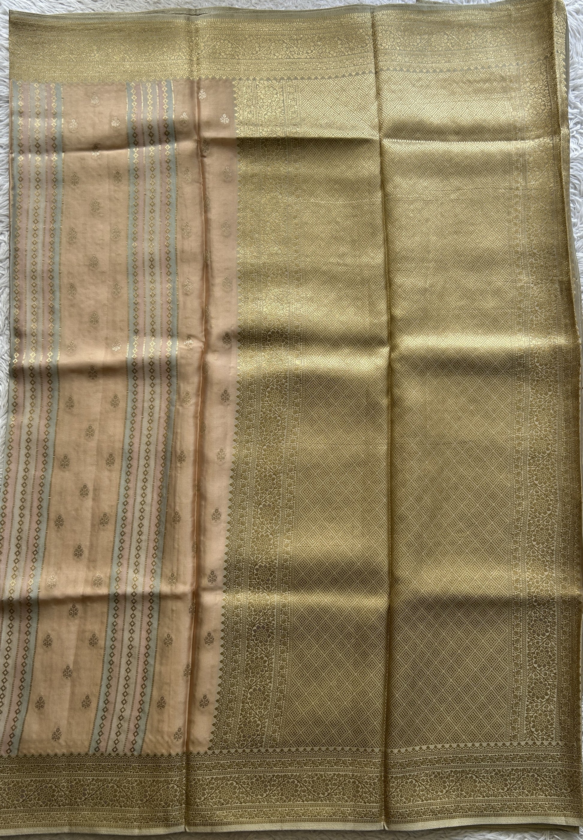 Pure Banarasi Crepe Silk Saree Light Peach Colored Complemented with a Zari border. - Sampradaya Designer Studio