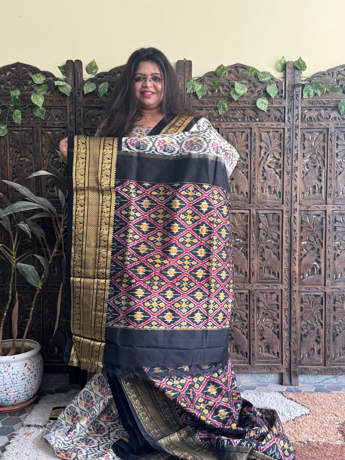 Ikkat Pattu Saree Off White colored complemented with a Kanchi border. - Sampradaya Designer Studio