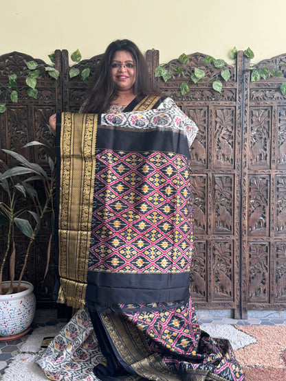 Ikkat Pattu Saree Off White colored complemented with a Kanchi border. - Sampradaya Designer Studio