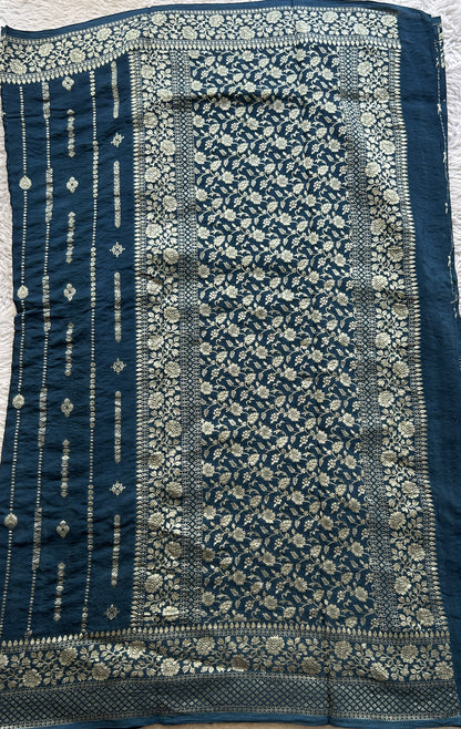 Semi Georgette Saree Peacock Blue Colored Paired with a Zari Border. - Sampradaya Designer Studio