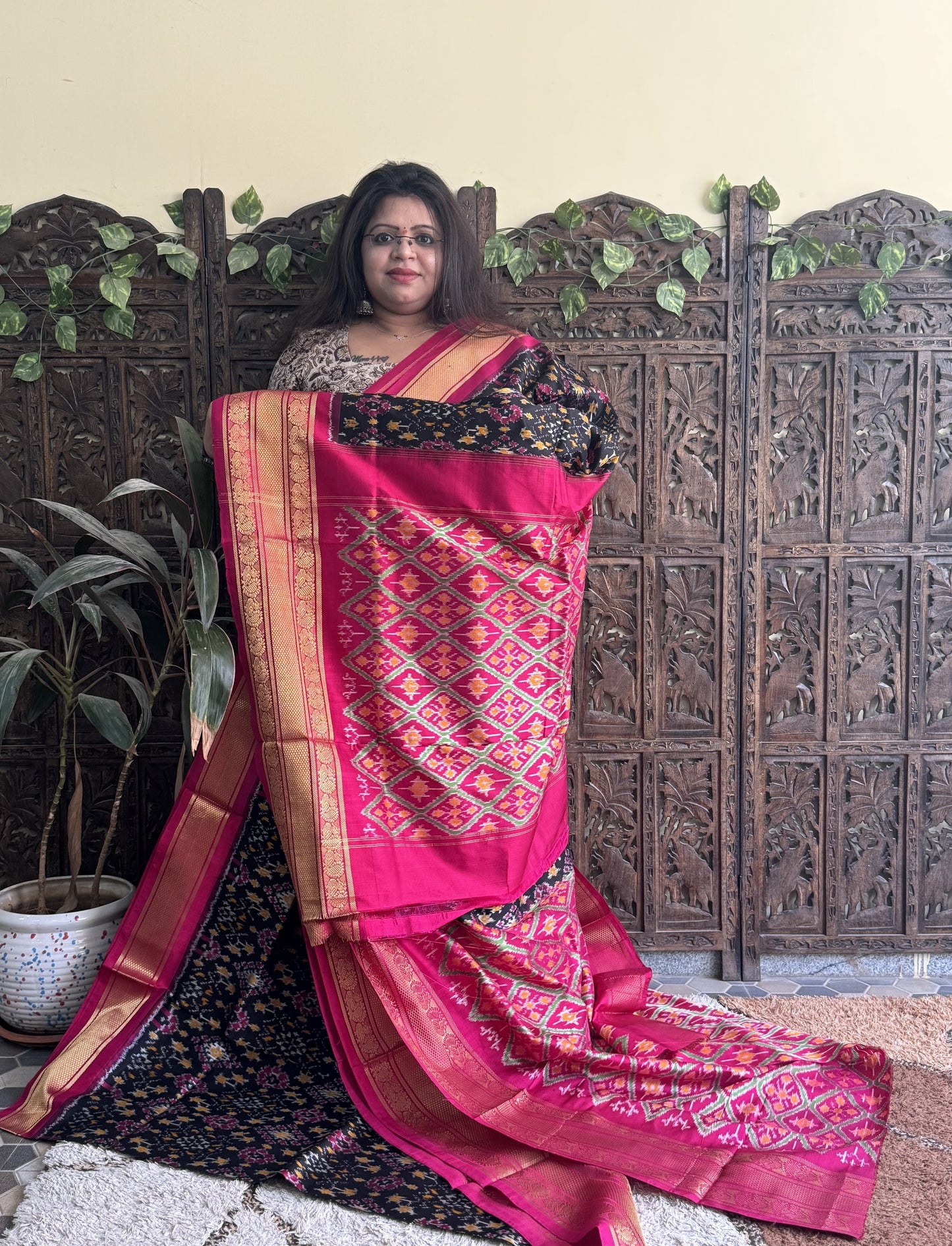 Ikkat Pattu Saree Black colored complemented with a Kanchi border. - Sampradaya Designer Studio