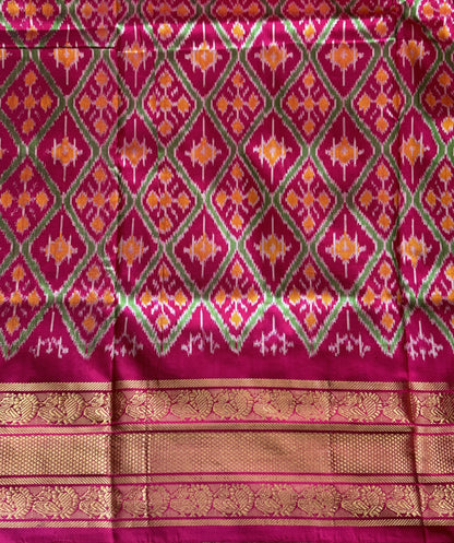 Ikkat Pattu Saree Black colored complemented with a Kanchi border. - Sampradaya Designer Studio