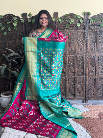 Ikkat Pattu Saree Dark Pink colored complemented with a Kanchi border. - Sampradaya Designer Studio