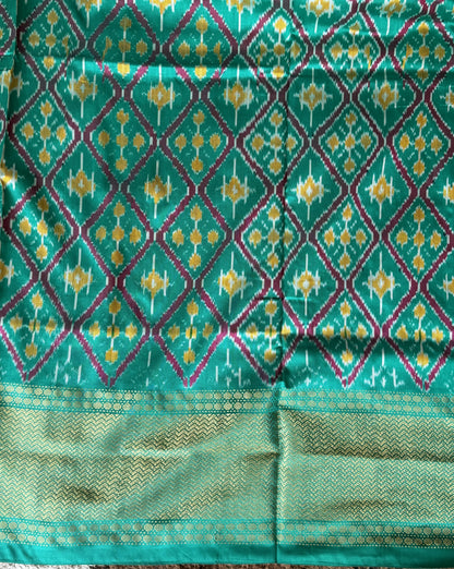 Ikkat Pattu Saree Dark Pink colored complemented with a Kanchi border. - Sampradaya Designer Studio