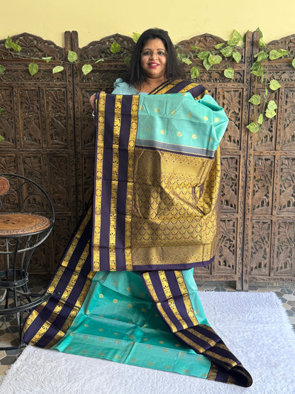 Pure Kanjivaram Silk Saree Jungle Colored Elegantly Paid with a Gold Zari Border