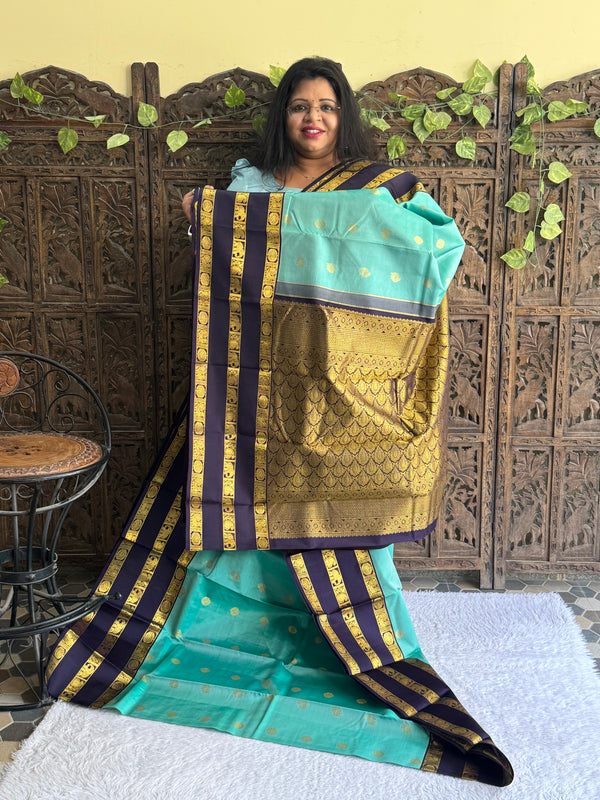 Pure Kanjivaram Silk Saree Jungle Colored Elegantly Paid with a Gold Zari Border - Sampradaya Designer Studio