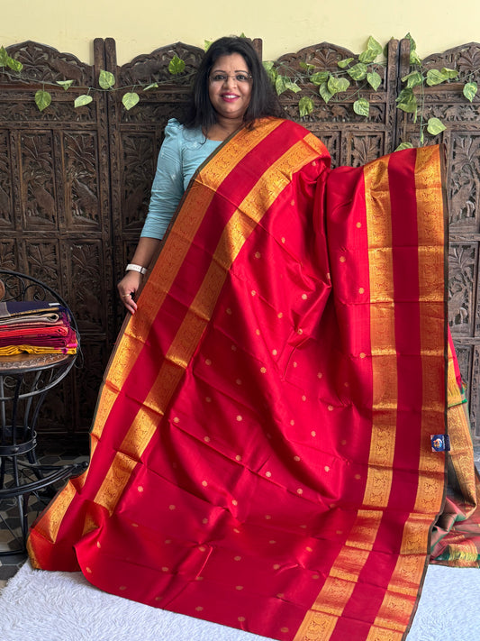 Pure Kanjivaram Silk Saree Cherry Red Colored Elegantly Paid with a Gold Zari Border