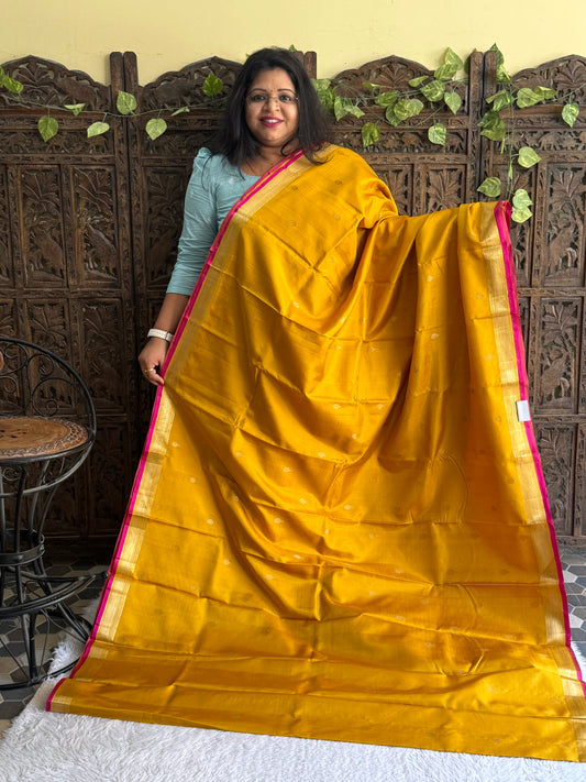 Pure Kanjivaram Silk Saree Yellow Colored Elegantly Paid with a Gold Zari Border.