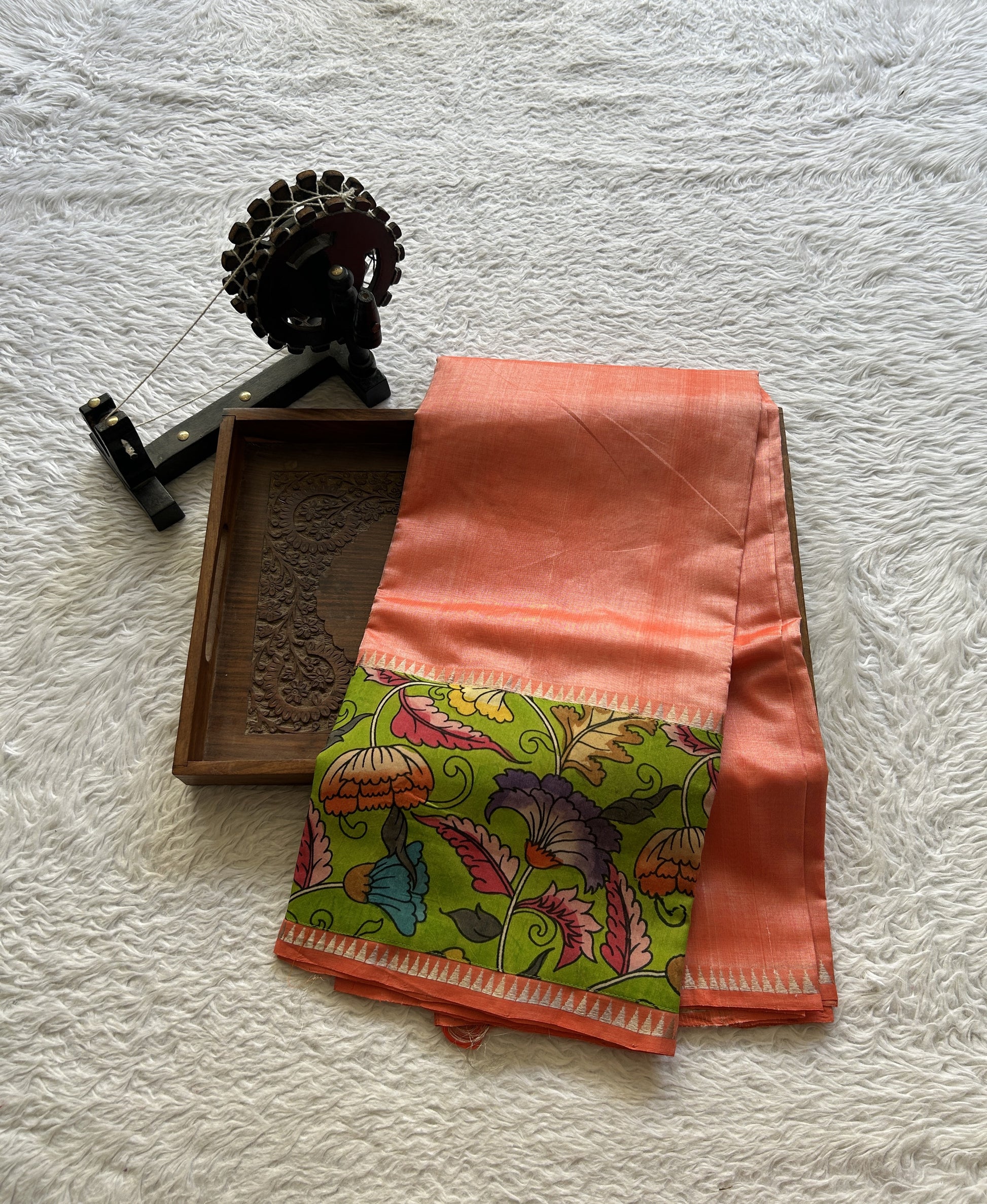 Mangalagiri Plain Pattu Saree Orange colored complemented with a Pen Kalamkari Border. - Sampradaya Designer Studio