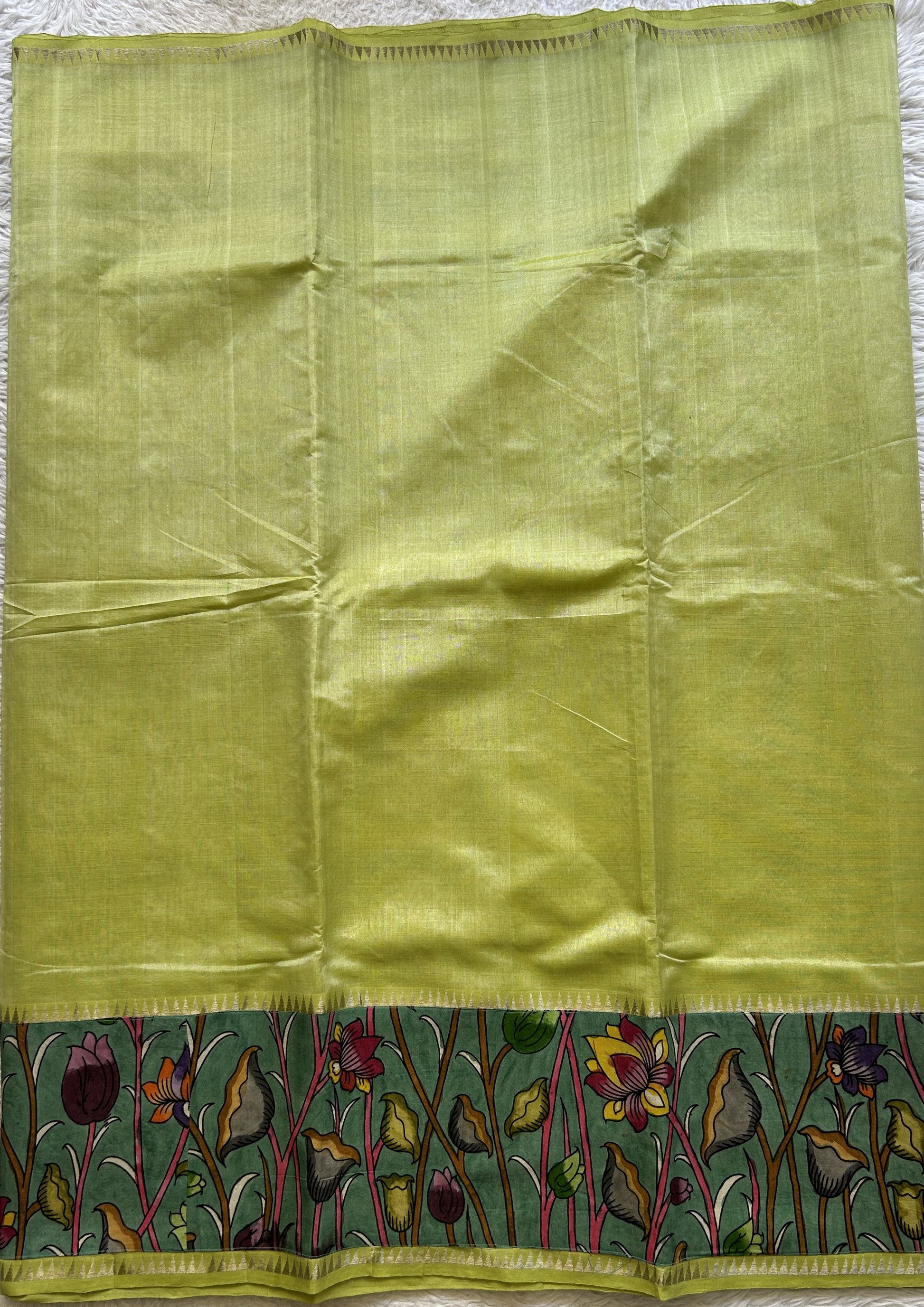 Mangalagiri Plain Pattu Saree Neon colored complemented with a Pen Kalamkari Border. - Sampradaya Designer Studio