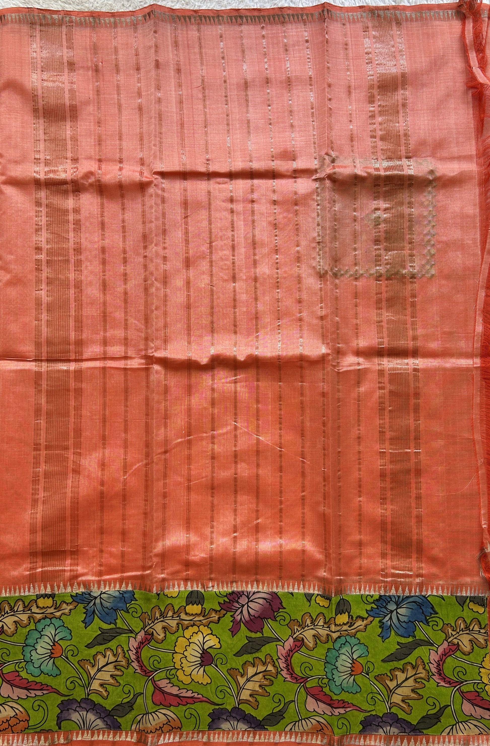 Mangalagiri Plain Pattu Saree Orange colored complemented with a Pen Kalamkari Border. - Sampradaya Designer Studio