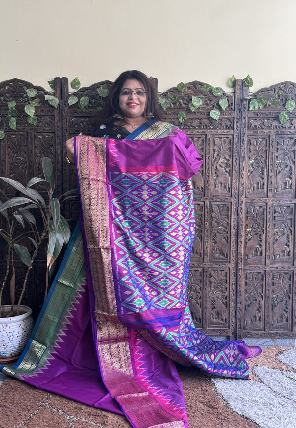 Ikkat Pattu Saree Purple colored complemented with a Violet Kanchi border. - Sampradaya Designer Studio