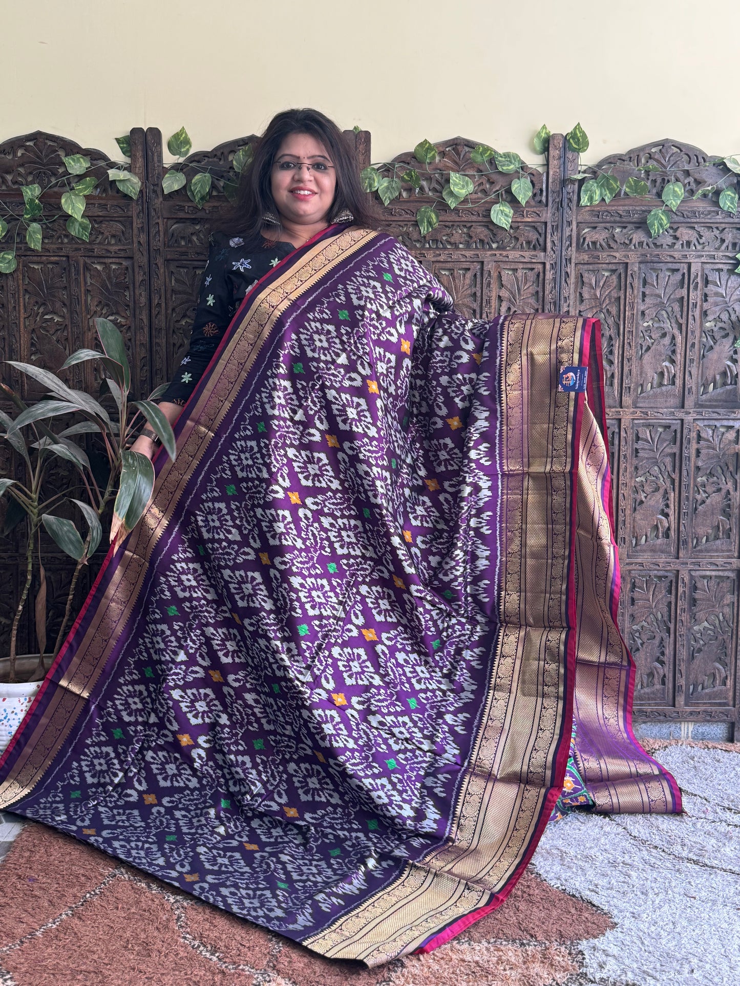 Ikkat Pattu Saree Violet colored complemented with a Kanchi border. - Sampradaya Designer Studio
