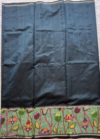 Mangalagiri Plain Pattu Saree Bottle Green colored complemented with a Pen Kalamkari Border. - Sampradaya Designer Studio