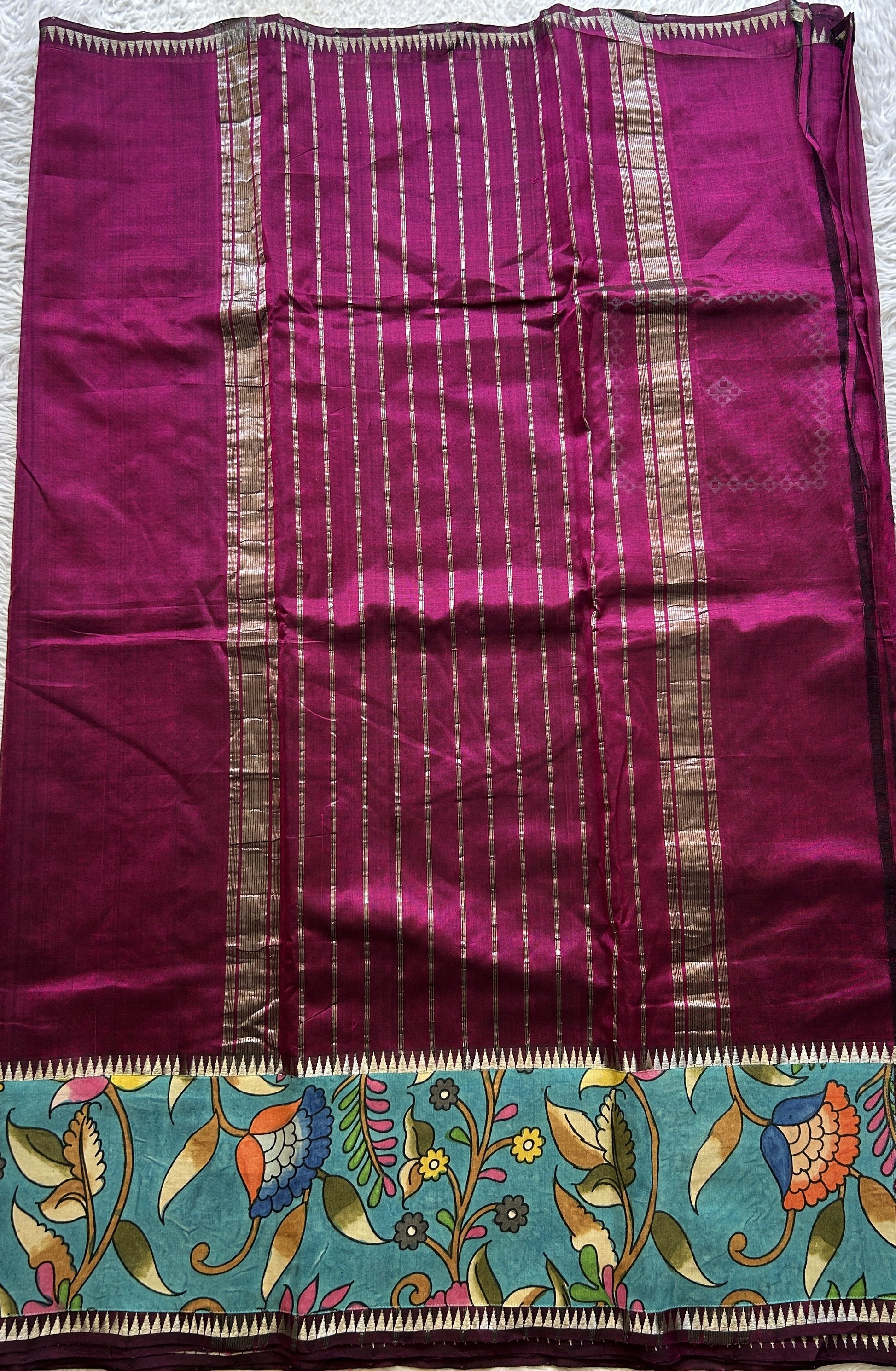Mangalagiri Plain Pattu Saree Purple colored complemented with a Pen Kalamkari Border. - Sampradaya Designer Studio