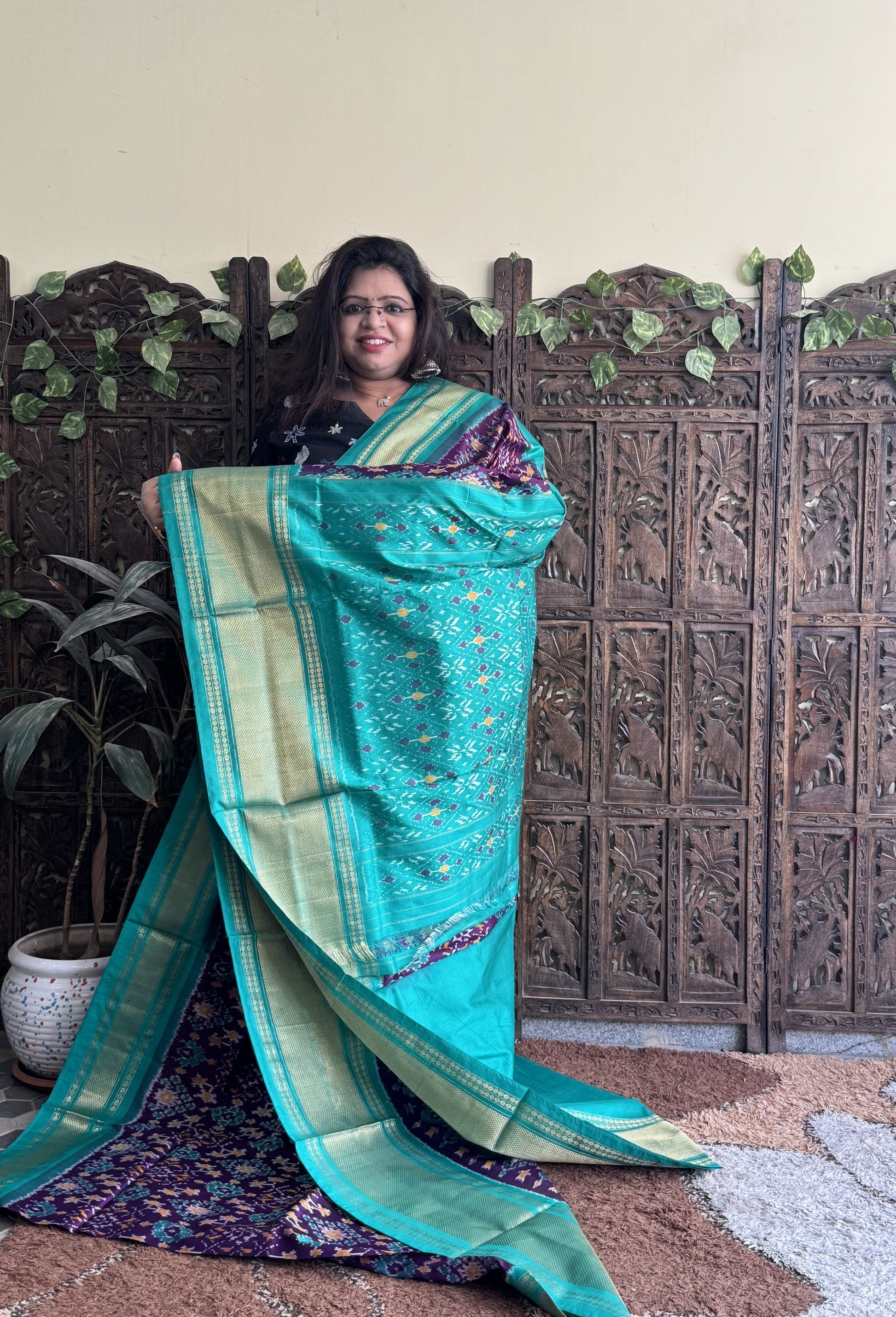 Ikkat Pattu Saree Purple colored complemented with a Sea Green Kanchi border. - Sampradaya Designer Studio