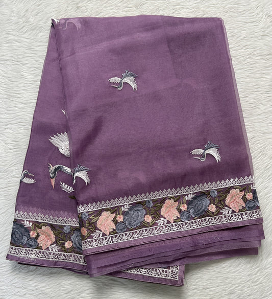 Soft Organza Designer Saree Lavender colored Saree complemented with a Machine Embroidery border. - Sampradaya Designer Studio