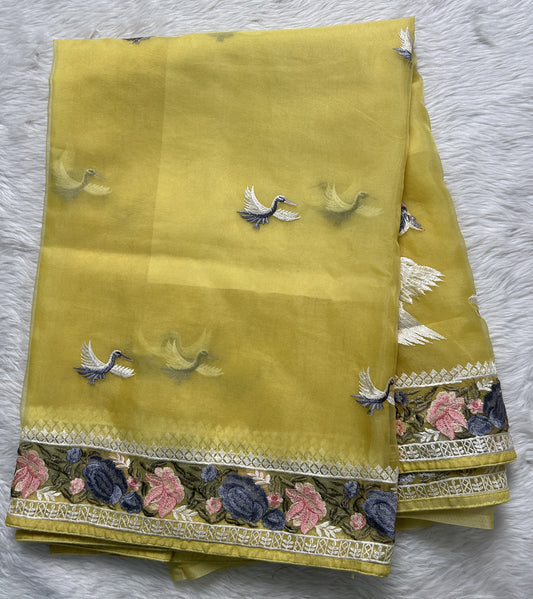 Soft Organza Designer Saree Yellow colored Saree complemented with a Machine Embroidery border. - Sampradaya Designer Studio