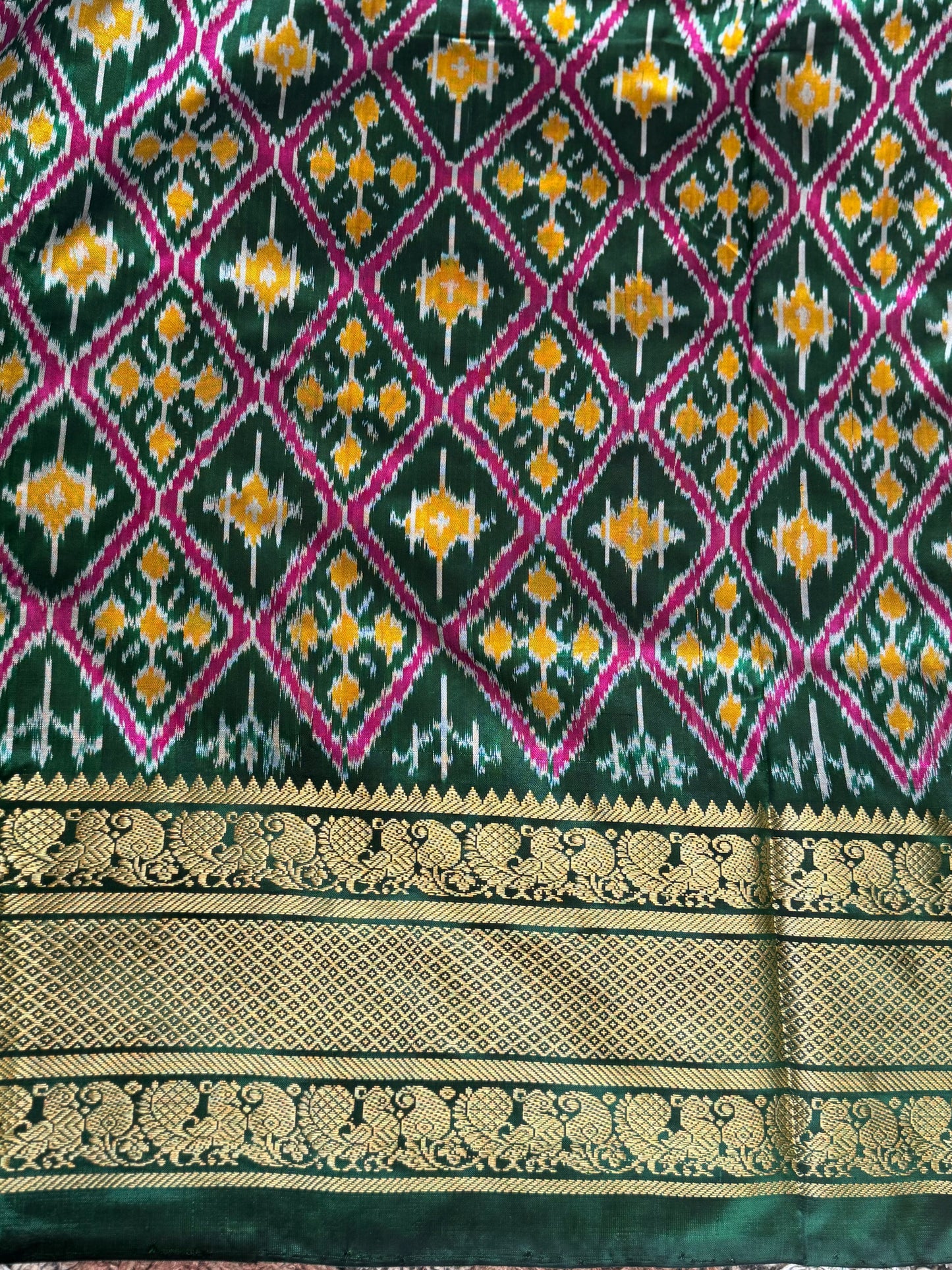 Ikkat Pattu Saree Yellow colored complemented with a Kanchi border. - Sampradaya Designer Studio
