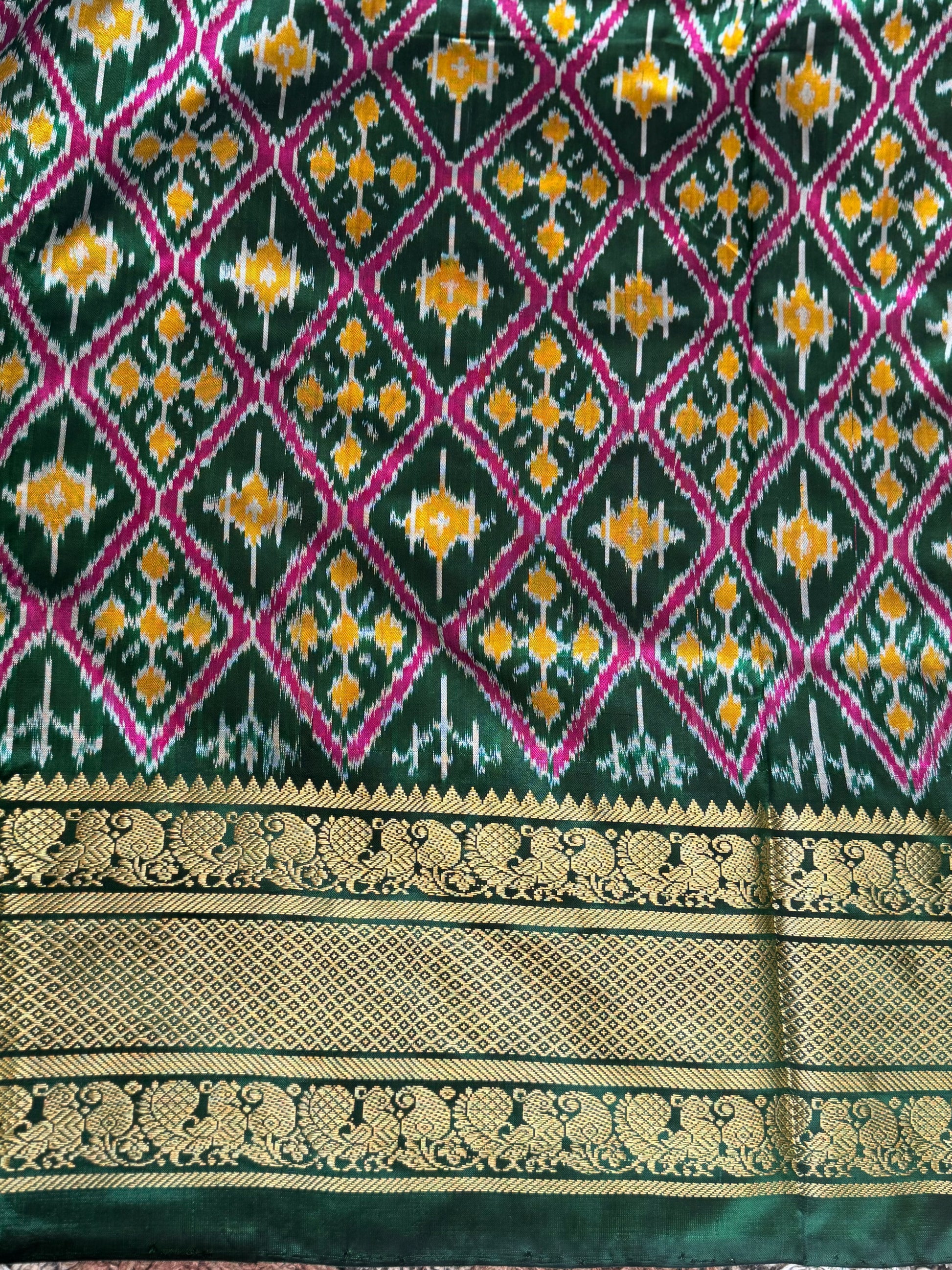 Ikkat Pattu Saree Yellow colored complemented with a Kanchi border. - Sampradaya Designer Studio