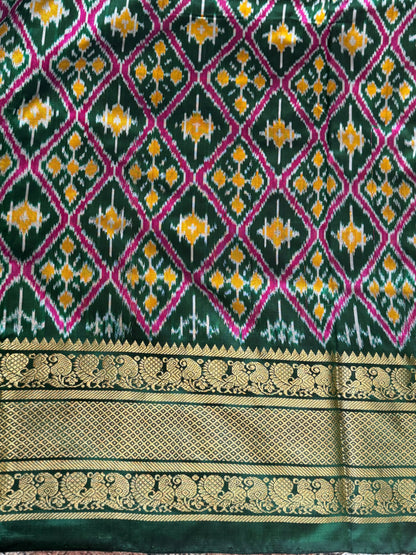 Ikkat Pattu Saree Yellow colored complemented with a Kanchi border. - Sampradaya Designer Studio