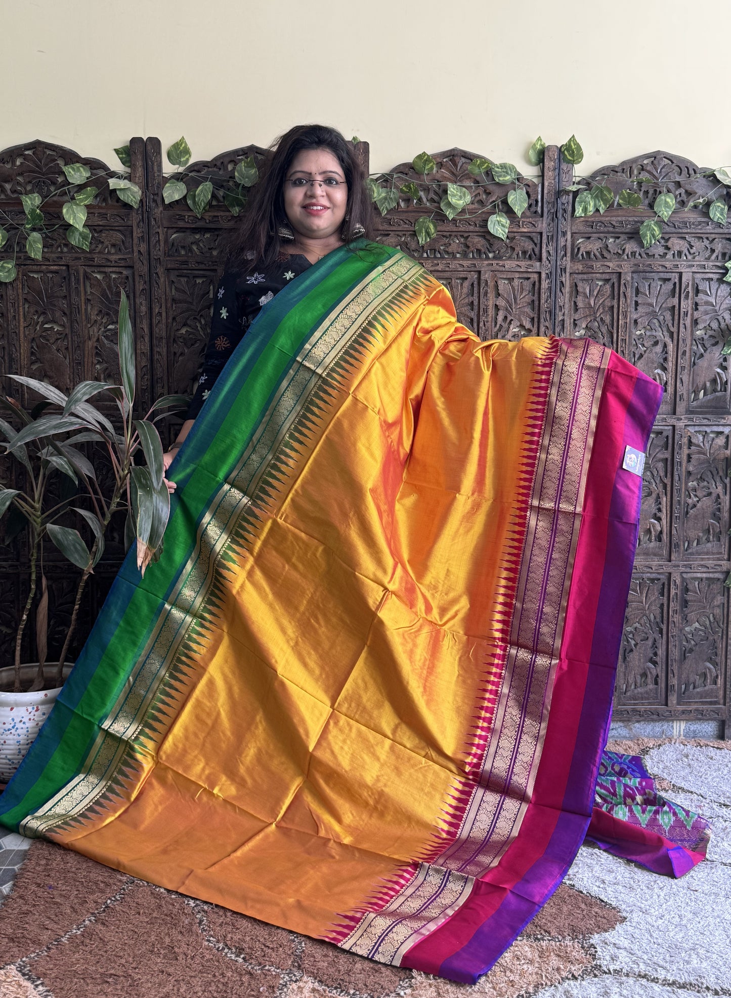 Ikkat Pattu Saree Turmeric Yellow colored complemented with a Kanchi border. - Sampradaya Designer Studio